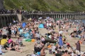 UK heatwave officially declared as temperatures top 32C on hottest day of the year so far