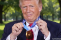 ‘I am keeping it’: Donald Trump jokes with Olympic speed skater after wearing his gold medal