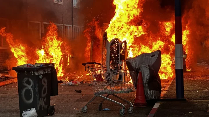 Belfast stabbing latest: Homes and cars set ablaze as protesters accused of ‘thuggery’ after knife attack