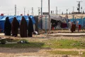 Australian woman and daughter to return from Syrian camp for IS families under strict conditions