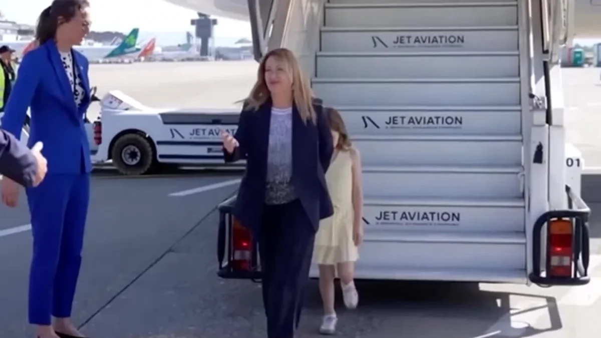 Melonis-young-daughter-avoids-spotlight-at-French-G7-arrival