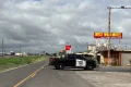 Suspect dead after standoff with police following shooting that killed one and left 10 hurt