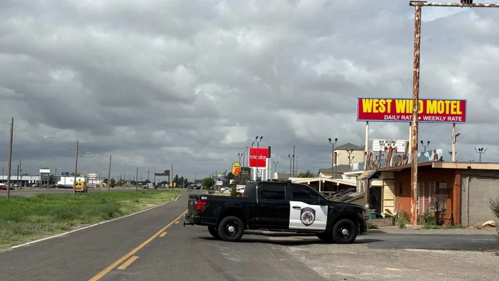 Suspect dead after standoff with police following shooting that killed one and left 10 hurt