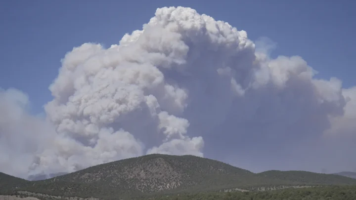 Dangerous weather hampers firefighters and leads to fireworks bans in western US