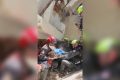 Rescue teams pull baby alive from beneath rubble after earthquake in Venezuela