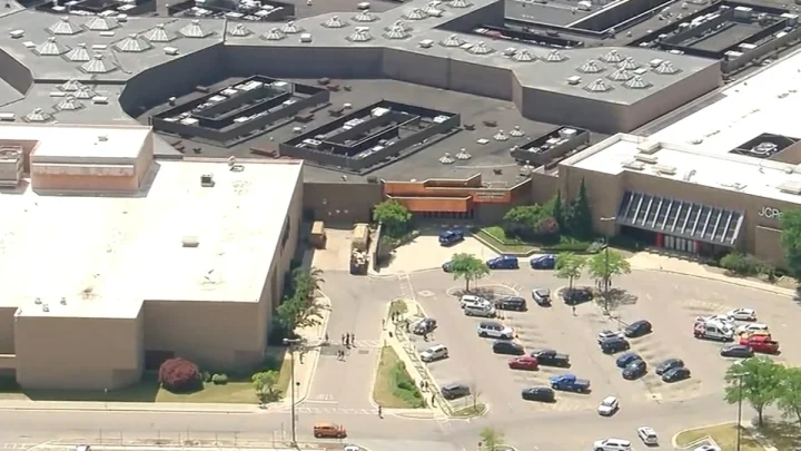 Police investigate a shopping mall shooting that left 2 dead in suburban Detroit