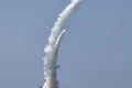 North Korean leader Kim observes weapons tests from new naval destroyer